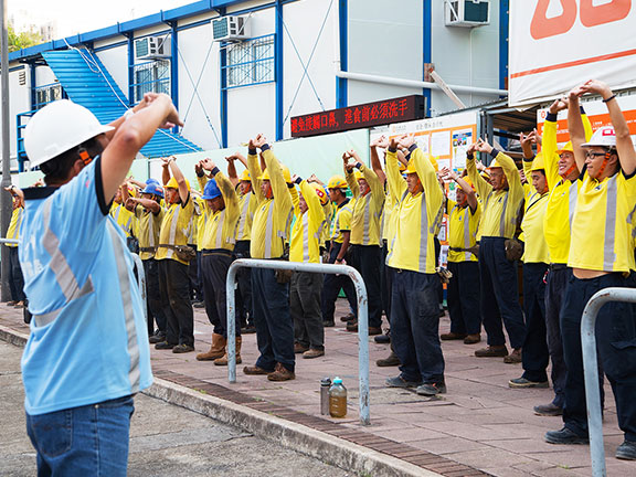 Morning exercise session led by site management